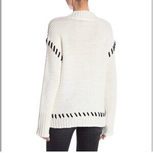 Design lab knit sweater with black detail. Women’s size medium.